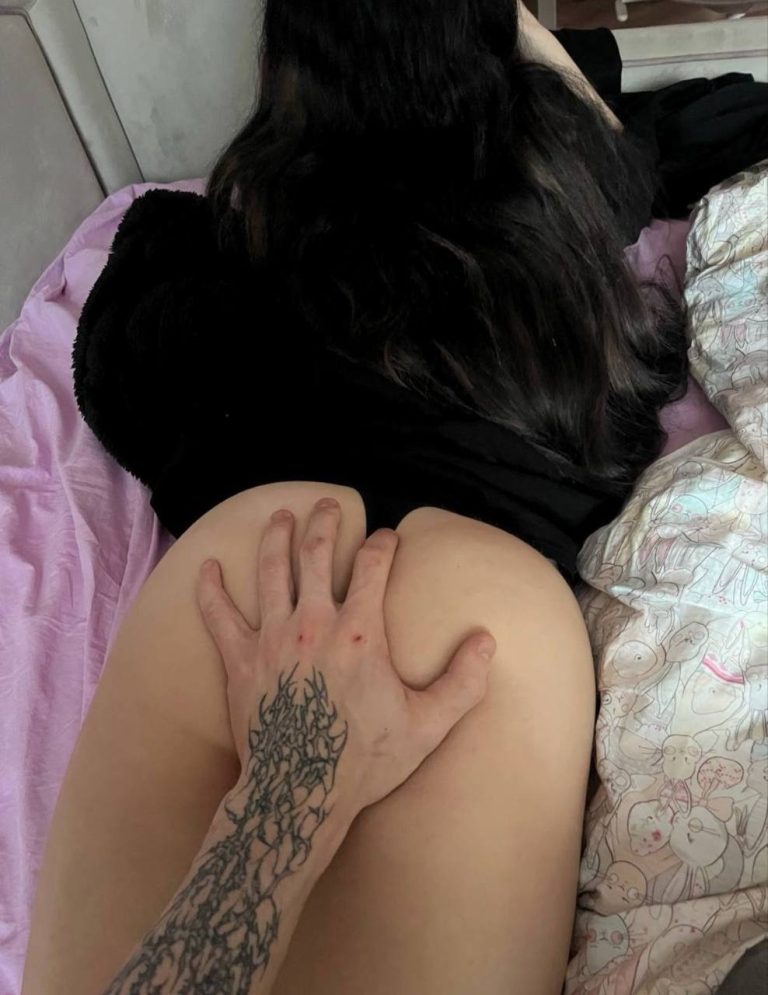 Hot young girl crawling on bed